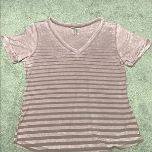 Buckle “eased” distress tee